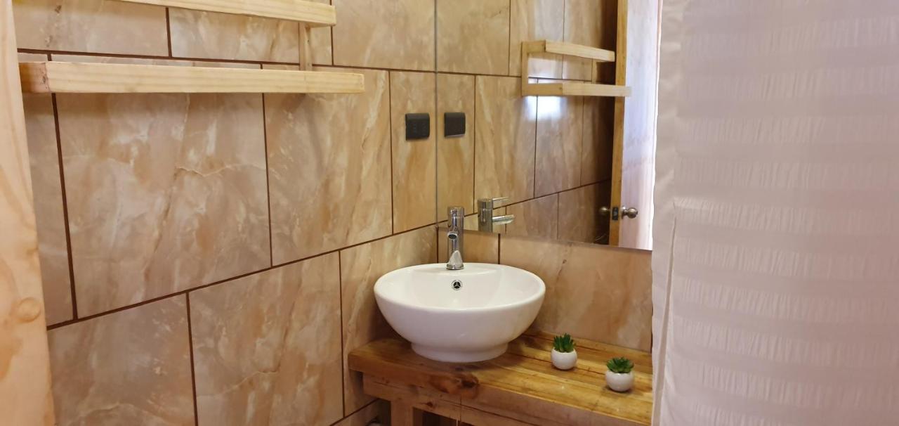 Apartamentos Tupuna Lodge ハンガ・ロア エクステリア 写真
